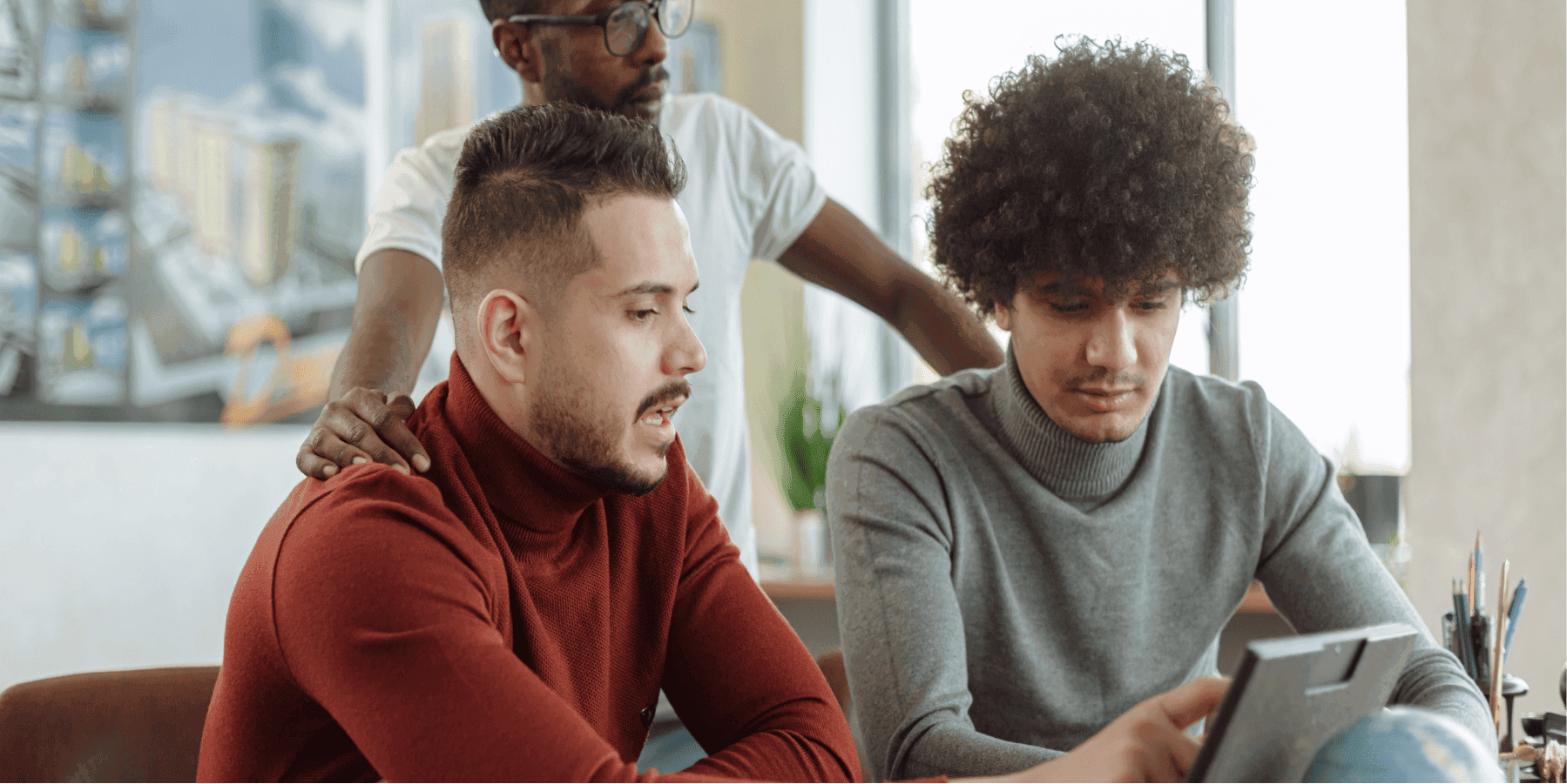 Three guys working