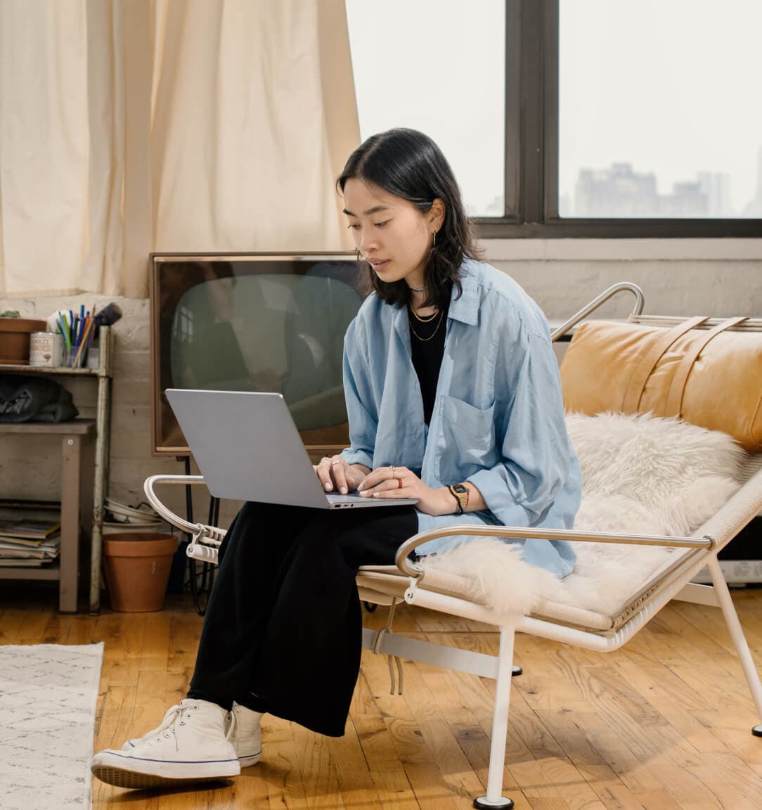 A woman working on a laptop