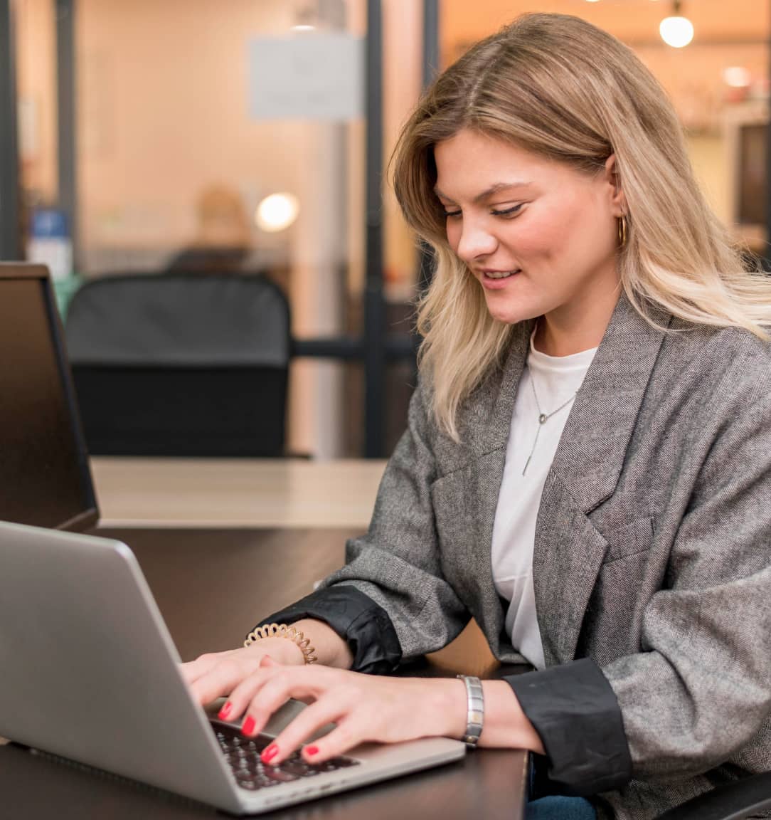 A woman working on a laptop