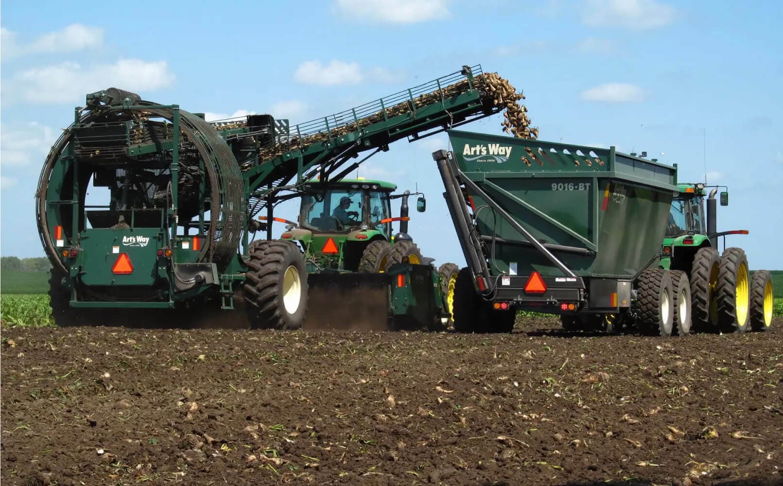 Two agricultural machineries