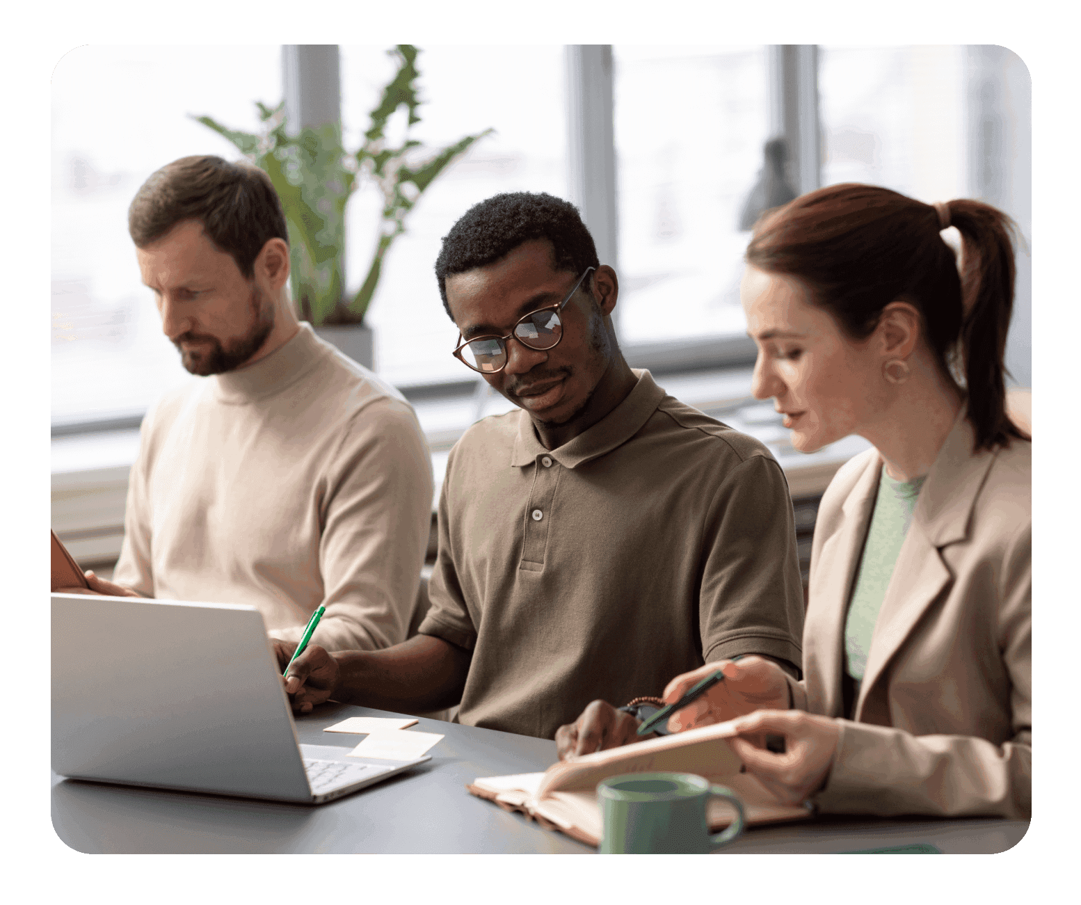 Three people working