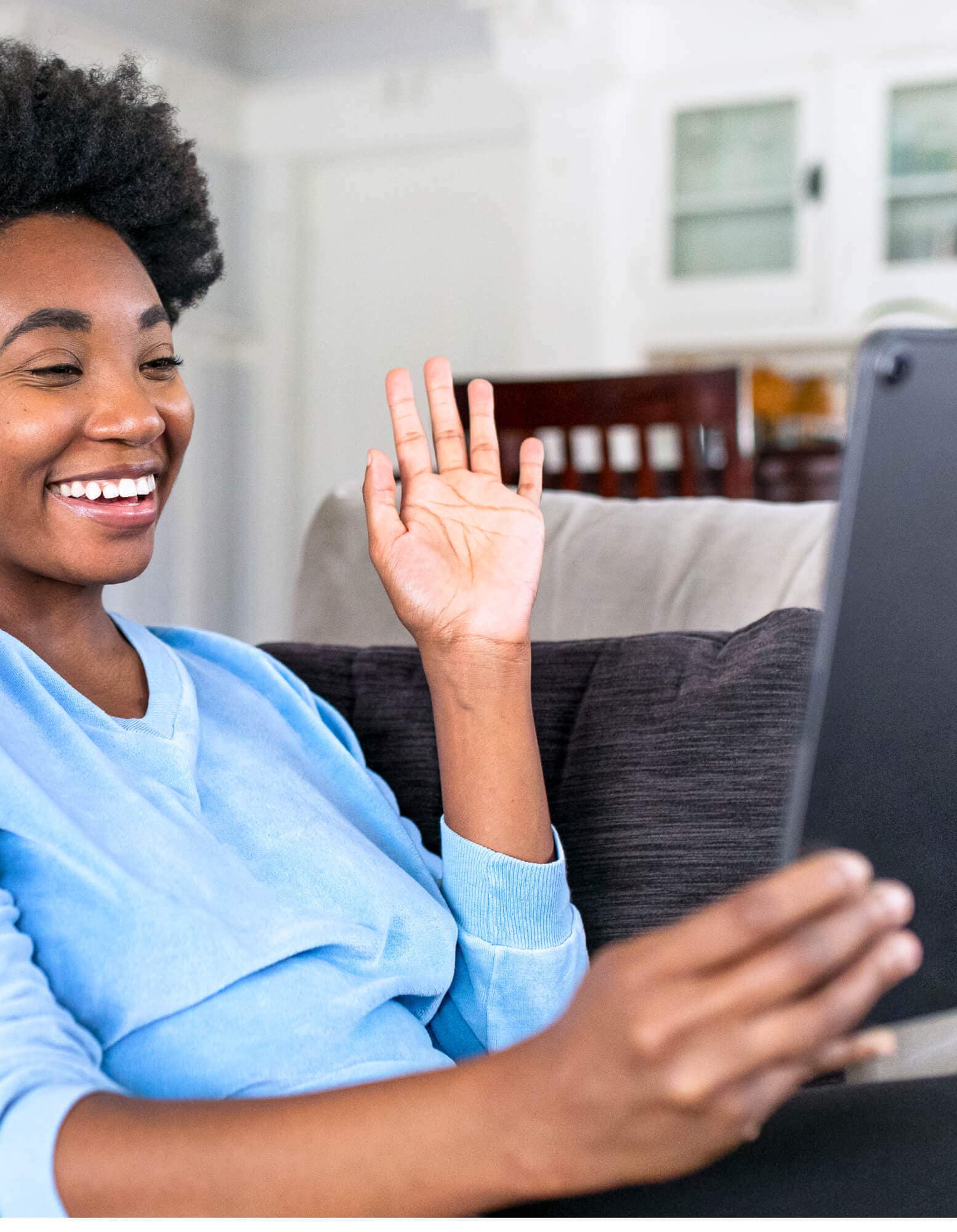 A worker having a video call from her home
