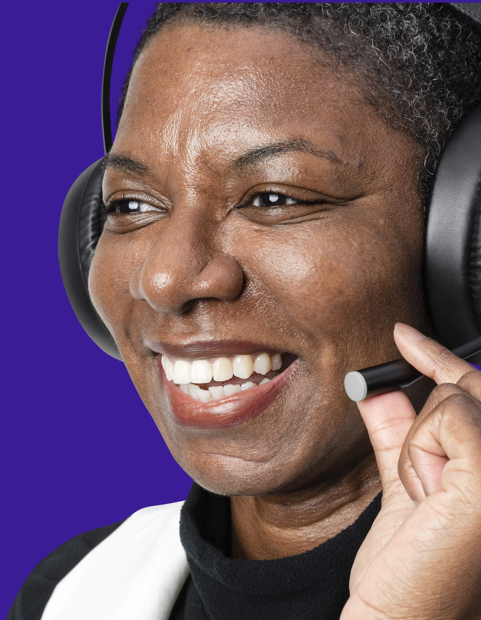 Photo of a contact centre agent on a call with a customer