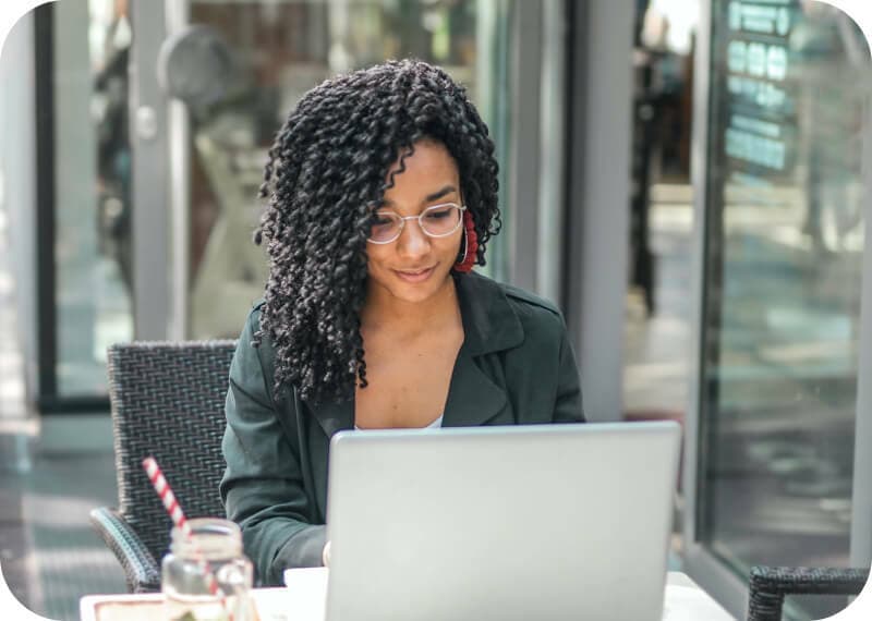 A woman working on a laptop