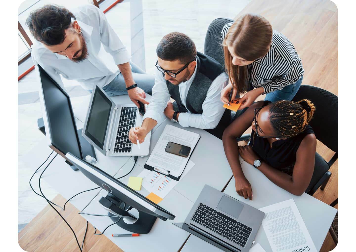 Four people working together