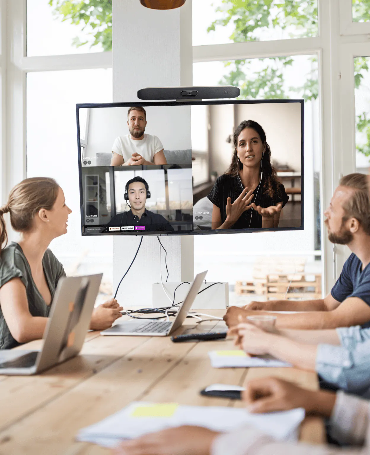 People in a videoconference meeting